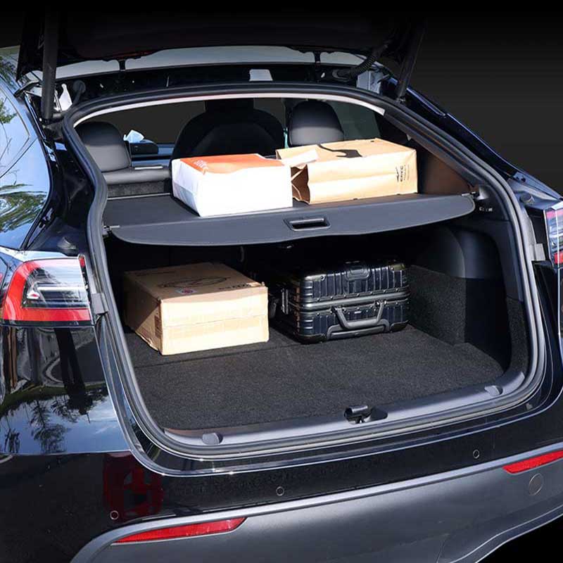 https://www.taptes.com/cdn/shop/products/TAPTES-Tesla-Model-Y-Retractable-Rear-Trunk-Privacy-Cargo-Cover-3_1400x.jpg?v=1698738335